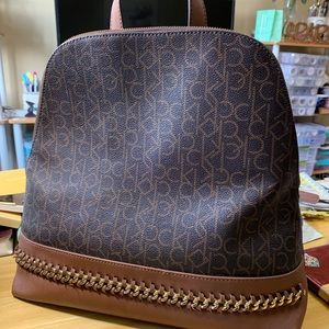 CALVIN KLEIN Monogram Logo Key Backpack Brown Bag